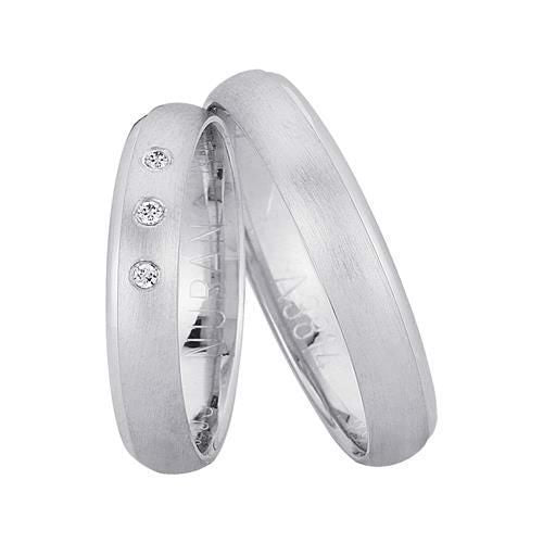 Elegant Nuran vielsesringe i 14 karat hvidguld med buet profil og 3 x 0,01 ct diamanter i dameringen.